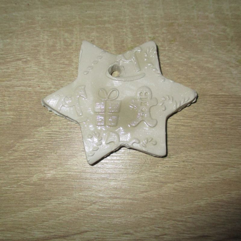 Colgante de cerámica infantil "estrella"