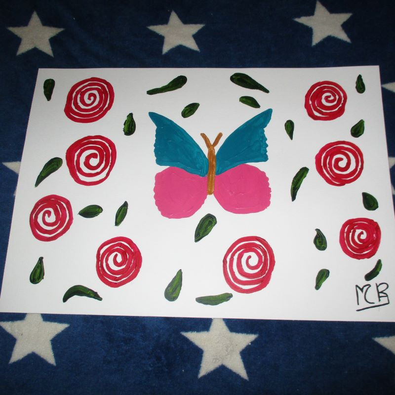 Mariposa y camelias